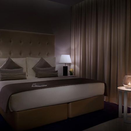 Damac Maison The Vogue Dubai Eksteriør billede A bedroom at the hotel